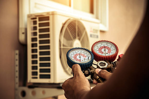 Professional Ac Installation technician working in North Pembroke, MA